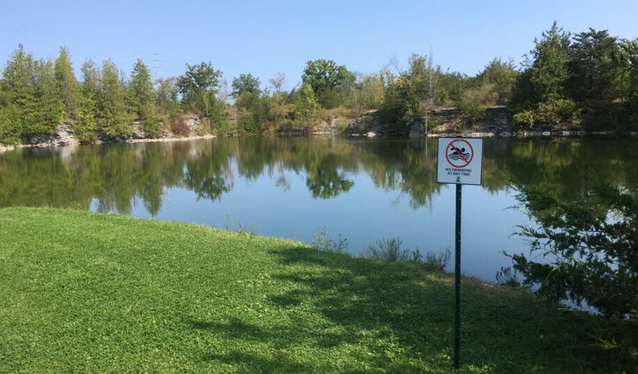 No swimming sign posted by the edge the the Seymour COnservation Area quarry